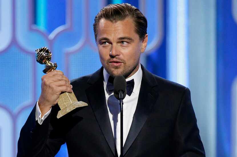 Leonardo DiCaprio accepts the award for best actor in a motion picture drama for his role in...
