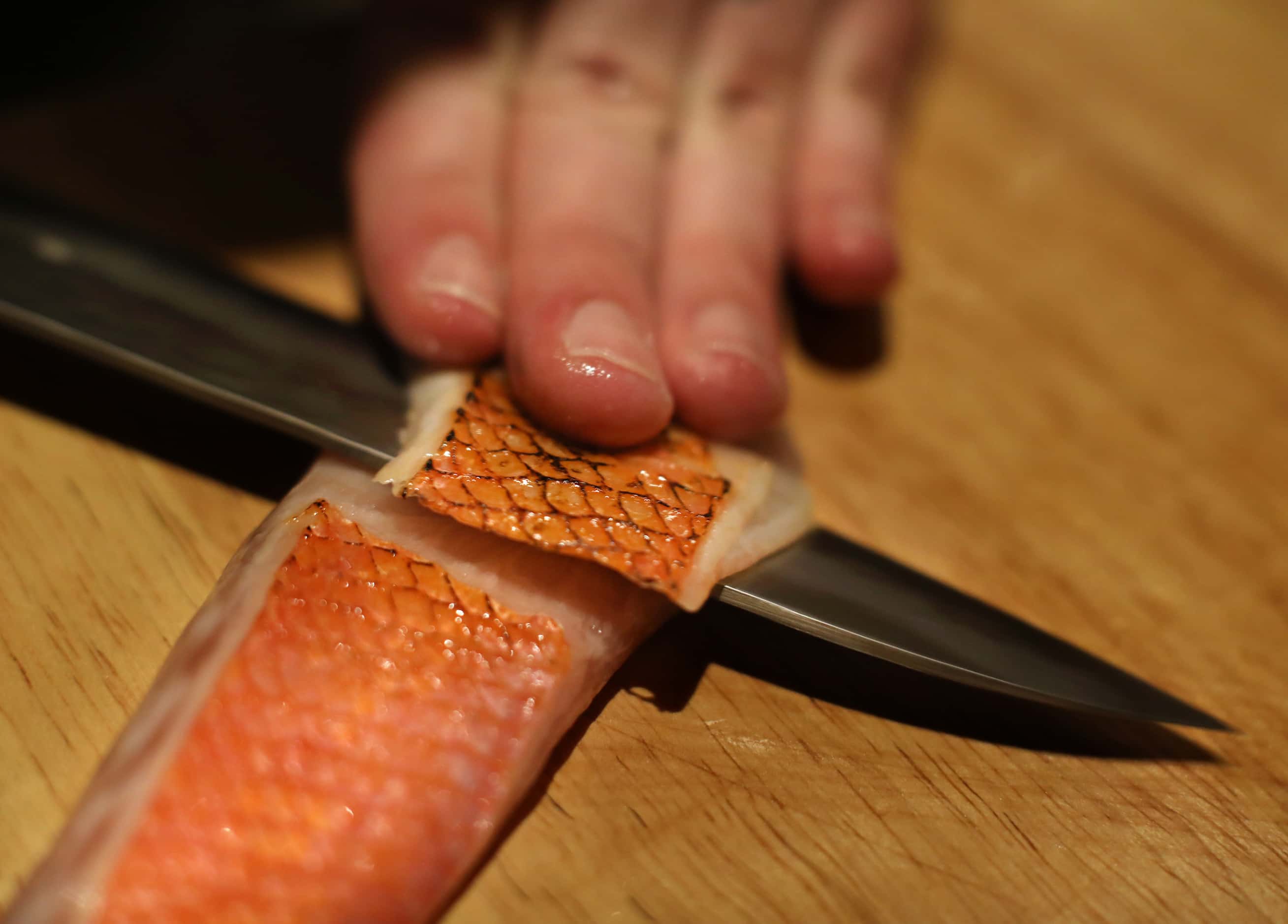 Shawn Goluechik prepares some Nigiri at Sushi By Scratch, a secret pop-up restaurant on the...