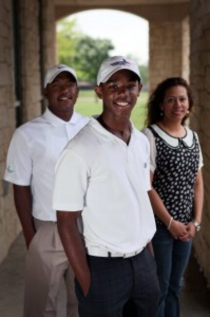  Cedar Crest golf pro Ira McGraw, left, his wife Yesenia McGraw, right, and their adopted...