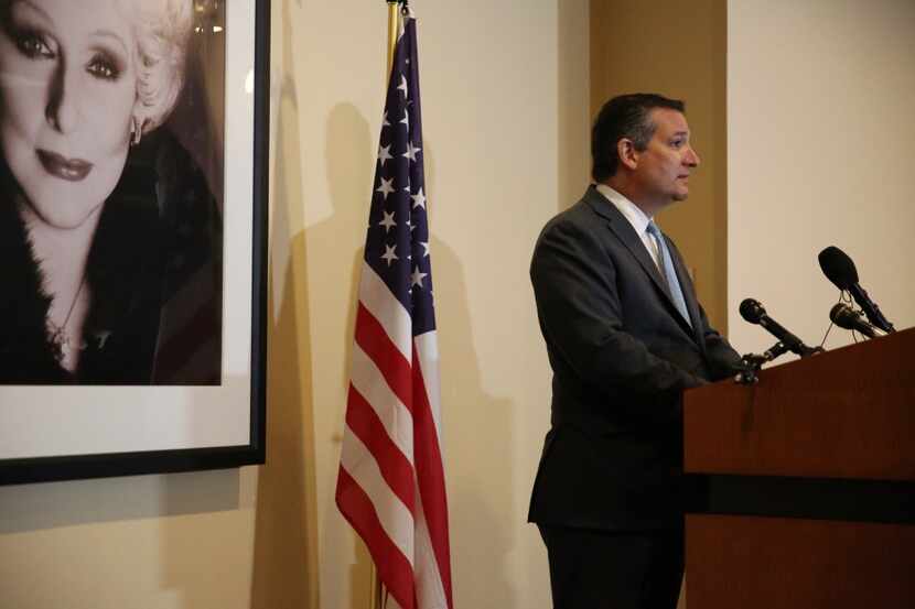 Texas Sen. Ted Cruz speaks to reporters while visiting the Mary Kay headquarters in Addison...