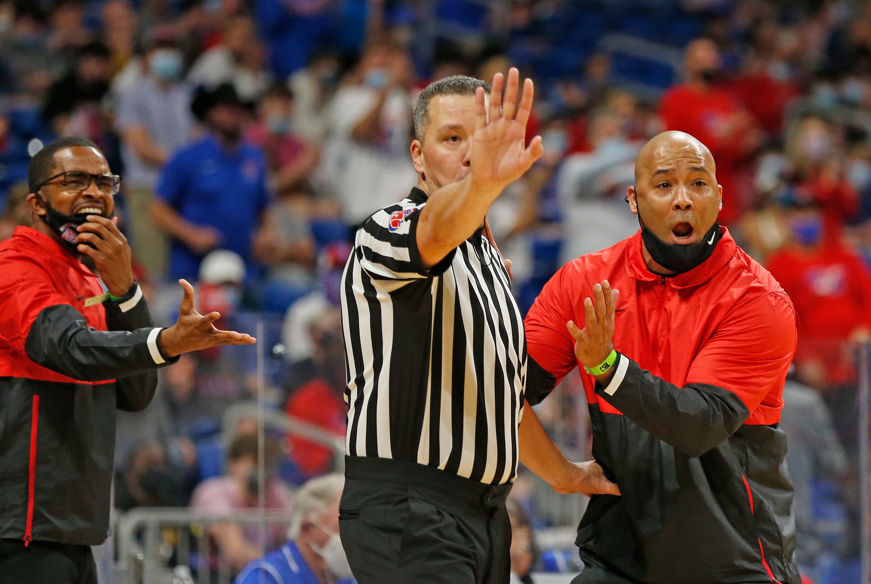 Duncanville head coach David Peavy pleads with official on a call. UIL boys Class 6A...