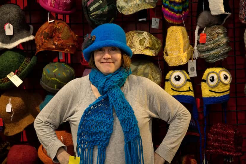 Knitter extraordinaire Kathy Davis models one of her playful creations at the Home Crafts...