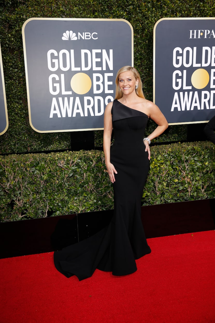 Reese Witherspoon arrives at the 75th Annual Golden Globes at the Beverly Hilton Hotel in...