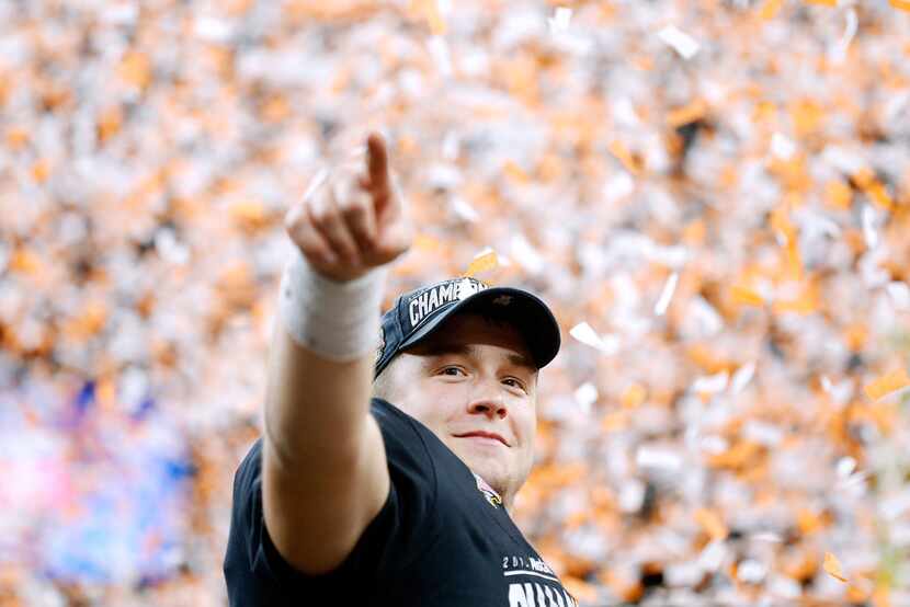 NEW ORLEANS, LOUISIANA - JANUARY 01: Sam Ehlinger #11 of the Texas Longhorns celebrates...