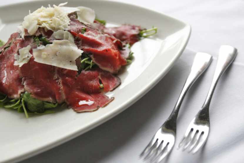 One of the better antipasti at Mi Piaci , carpaccio, is fine-quality, paper-thin beef draped...