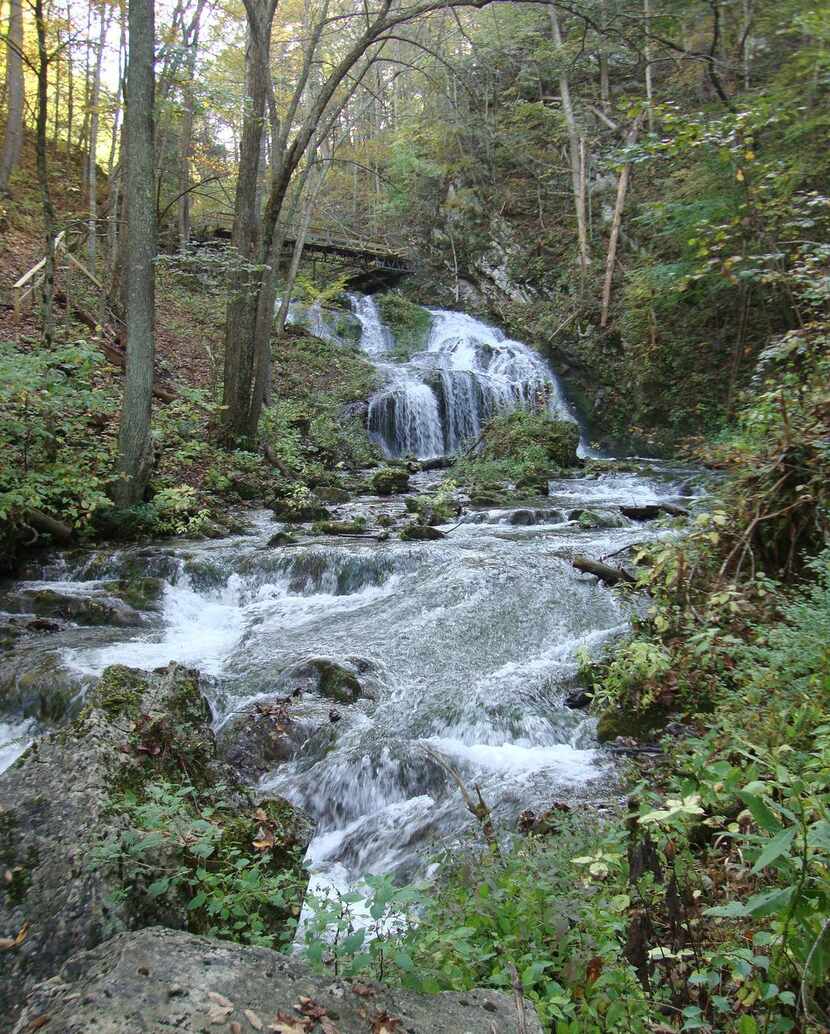 A guided nature hike  near the Omni Homestead Resort takes visitors to the scenic waterfall...