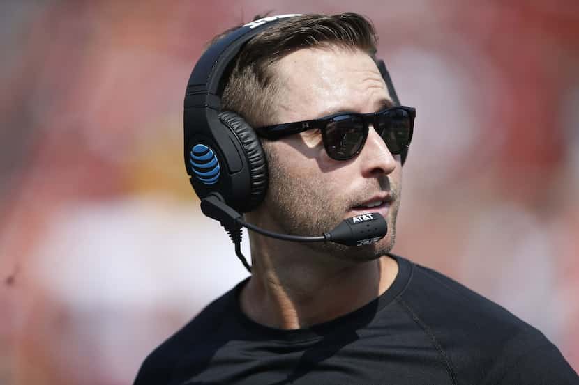 Texas Tech coach Kliff Kingsbury yells out to his players during an NCAA college football...