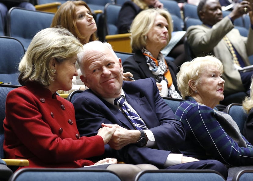 Former U.S. Sen. Kay Bailey Hutchison received a congratulatory handshake from billionaire...