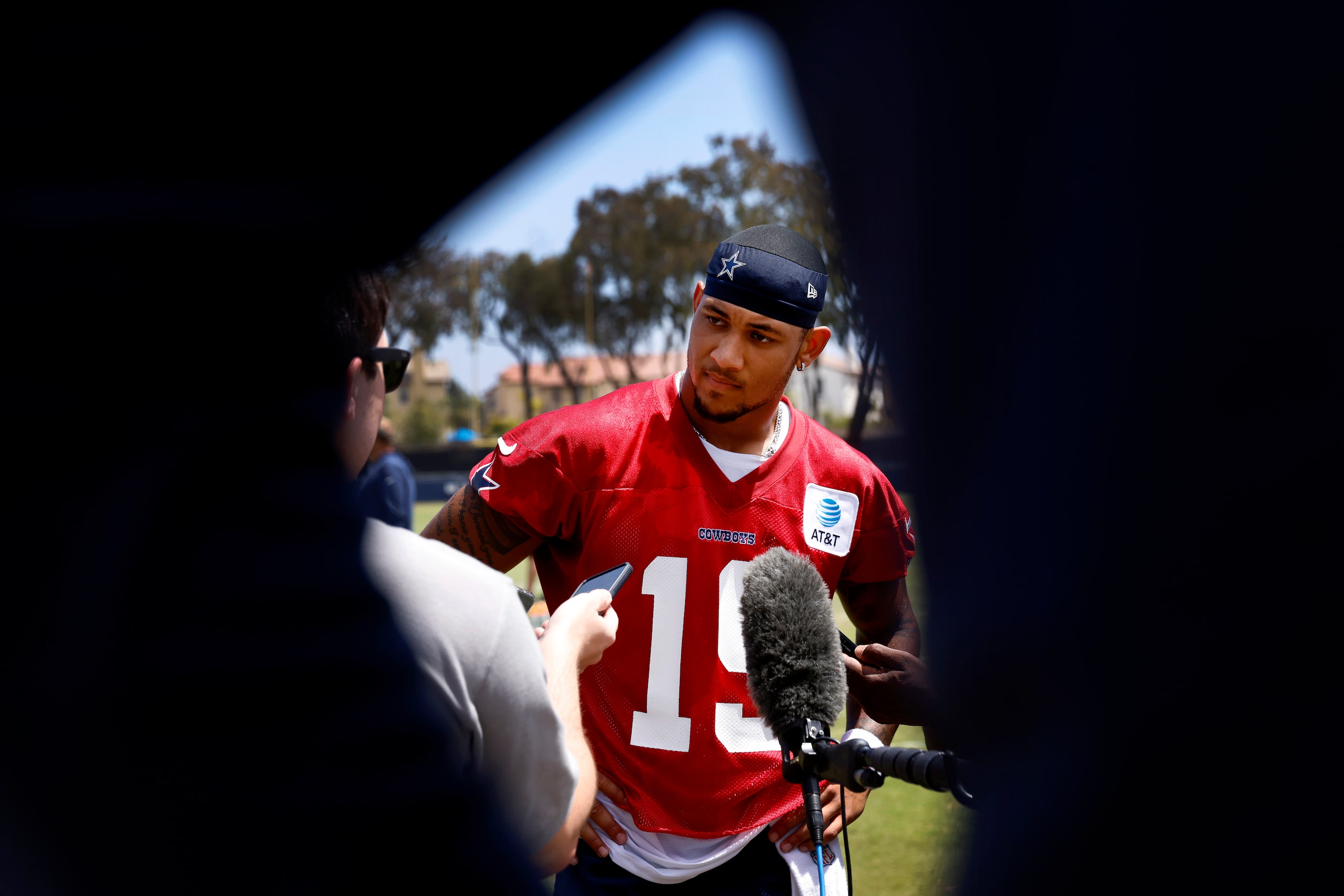 Dallas Cowboys quarterback Try Lance answers questions from the media following training...