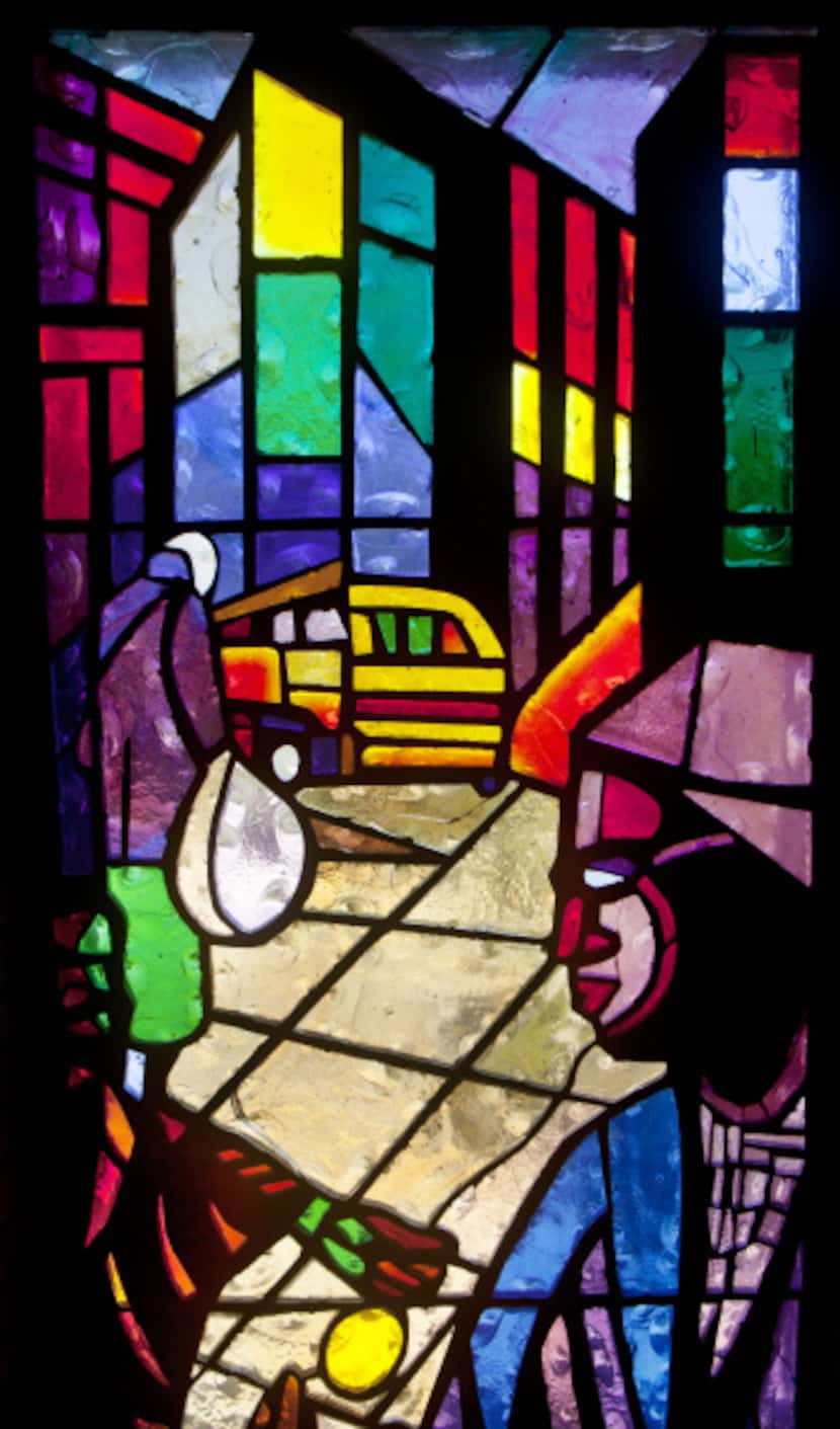 The Rosa Parks stained glass window designed by artist Jean Lacy in the Sanctuary of the St....