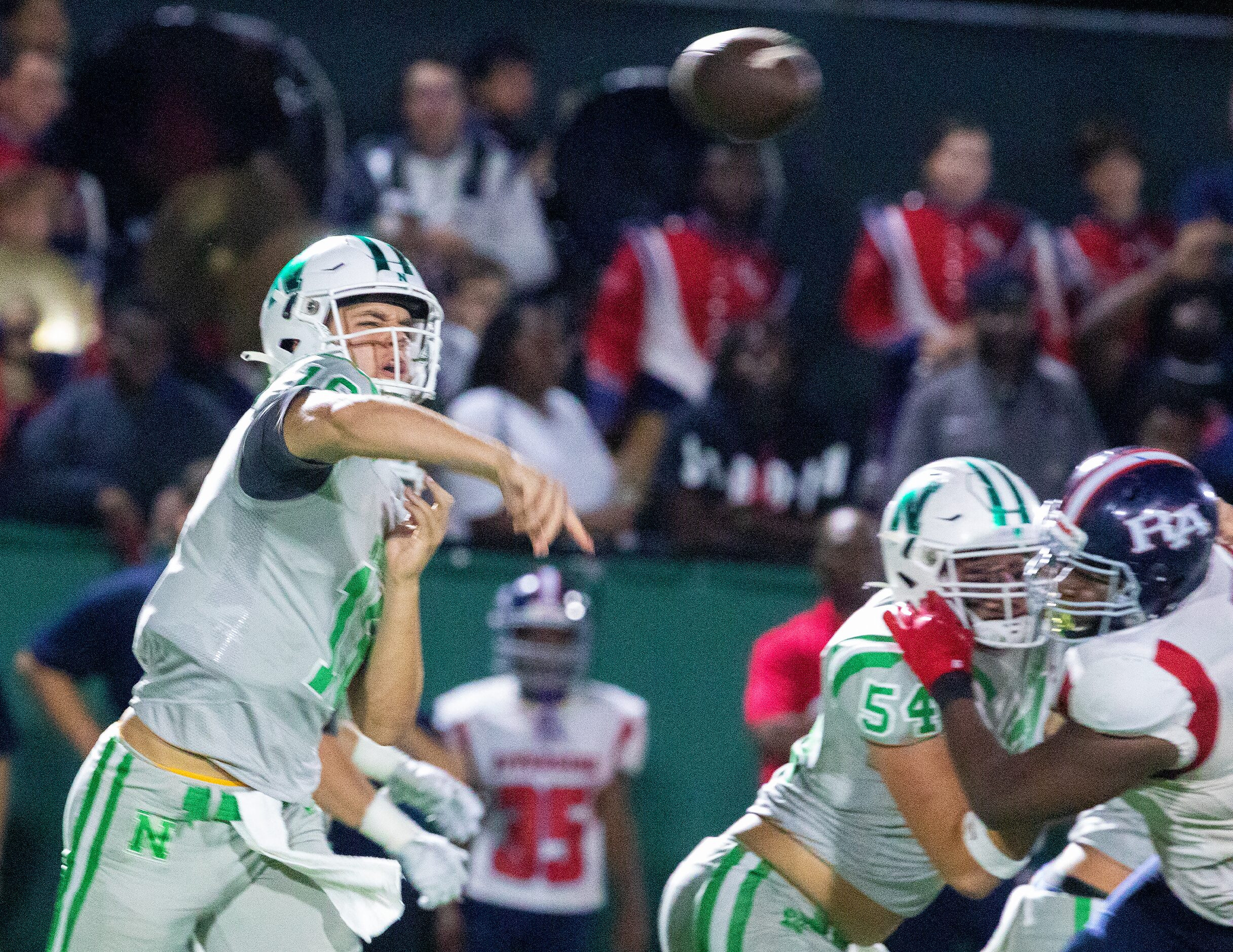 Arch Manning passes as Newman High School takes on Riverside Academy Friday, September 9,...