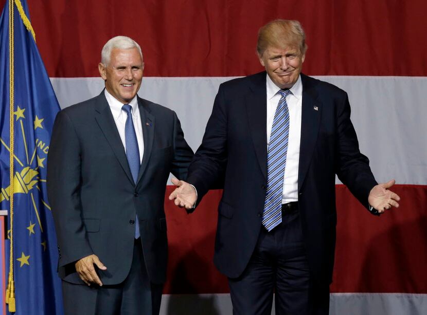 In this July 12, 2016 file photo, Indiana Gov. Mike Pence joins Republican presidential...