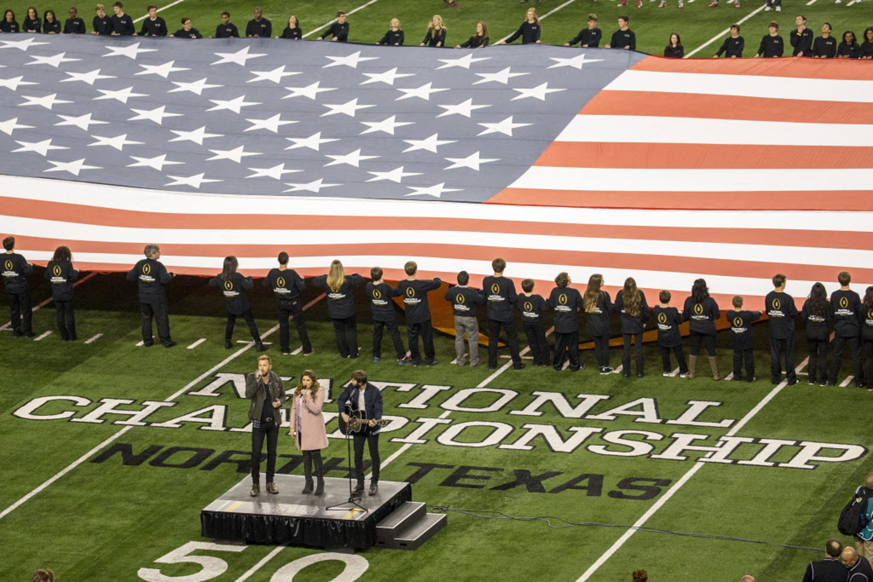 Lady Antebellum performs the national anthem before the College Football Playoff game at...