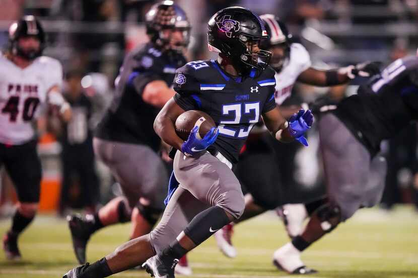 Mansfield Summit running back Orlando Scales (23) carries the ball during the second half of...