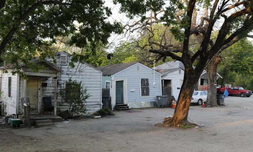  The city says this row of houses along Clarendon are "unfit for human habitation." (David...