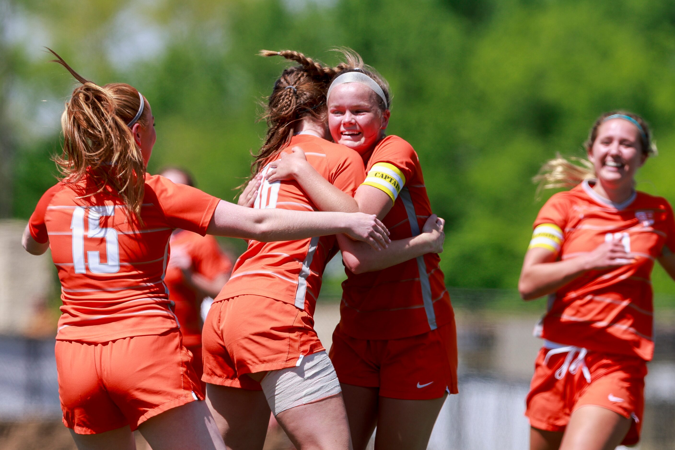 Celina midfielder Madi Vana (11) celebrates her goal with Celina forward Taylor Zdrojewski...