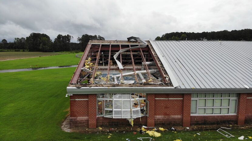 Debris from a tornado spun off by the remnants of Tropical Storm Debby, litters the campus...