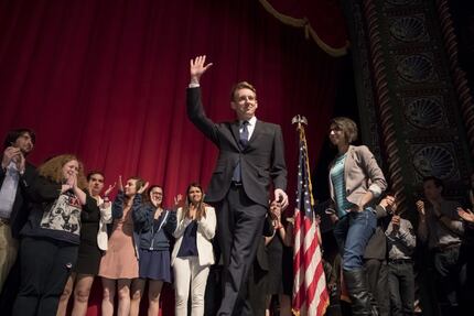 Jason Kander, Democratic candidate for U.S. Senate in Missouri, waves to supporters before...