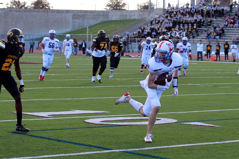Midlothian Heritage's Jay Wilkerson (8) is wide open and takes his pass reception to the end...