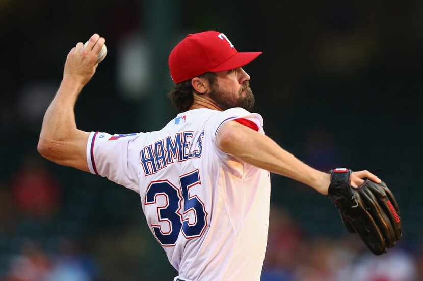 ARLINGTON, TX - AUGUST 28: Cole Hamels #35 of the Texas Rangers throws against the Baltimore...