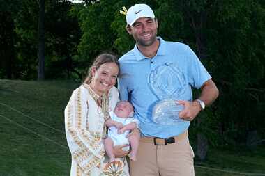 Scottie Scheffler, right, poses for a photo with his wife, Meredith, son Bennett and the...