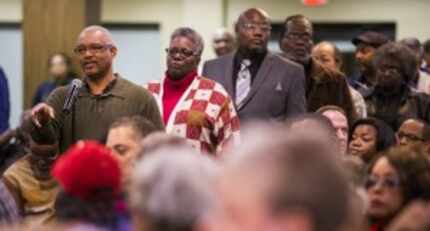  Dallas residents line up to ask questions of Dallas District Attorney Susan Hawk at her...