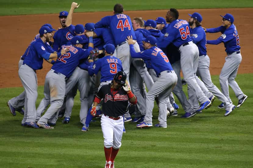 The Chicago Cubs celebrate winning the World Series at the end of Game 7 of the World Series...