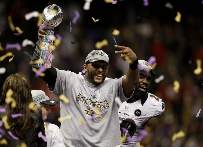 FILE - In this Feb. 3, 2013, file photo, Baltimore Ravens linebacker Ray Lewis holds up the...