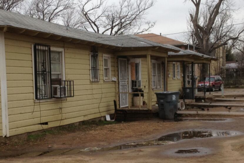Four-plex at Collins Avenue and Carter Street has peeling paint, rotted siding and other...
