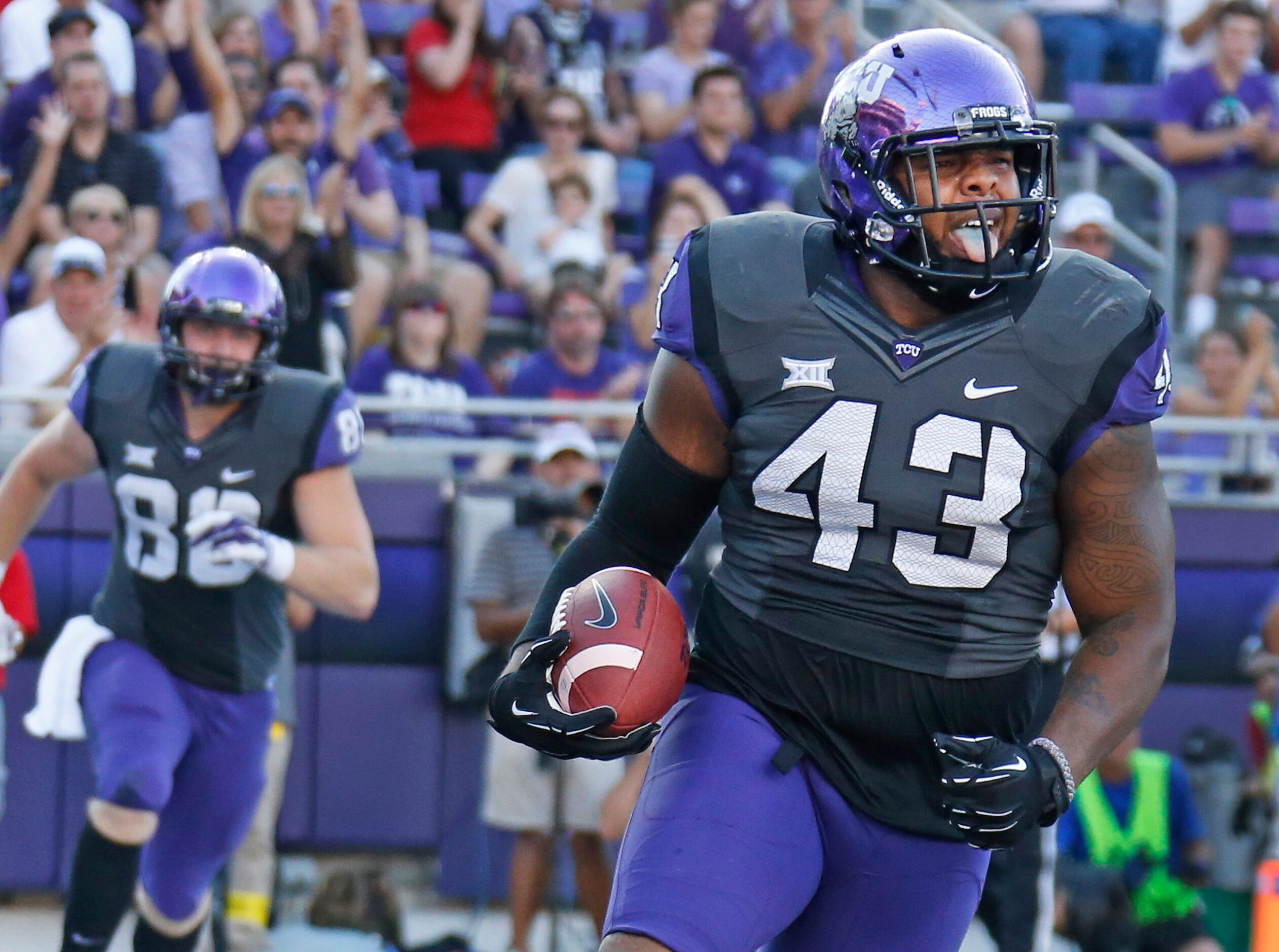 TCU Horned Frogs tight end Cliff Murphy (43) celebrates catching a third quarter touchdown...