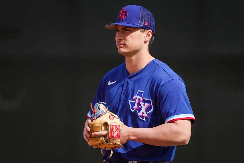 Infielder Justin Foscue participates in a drill during a Texas Rangers minor league spring...