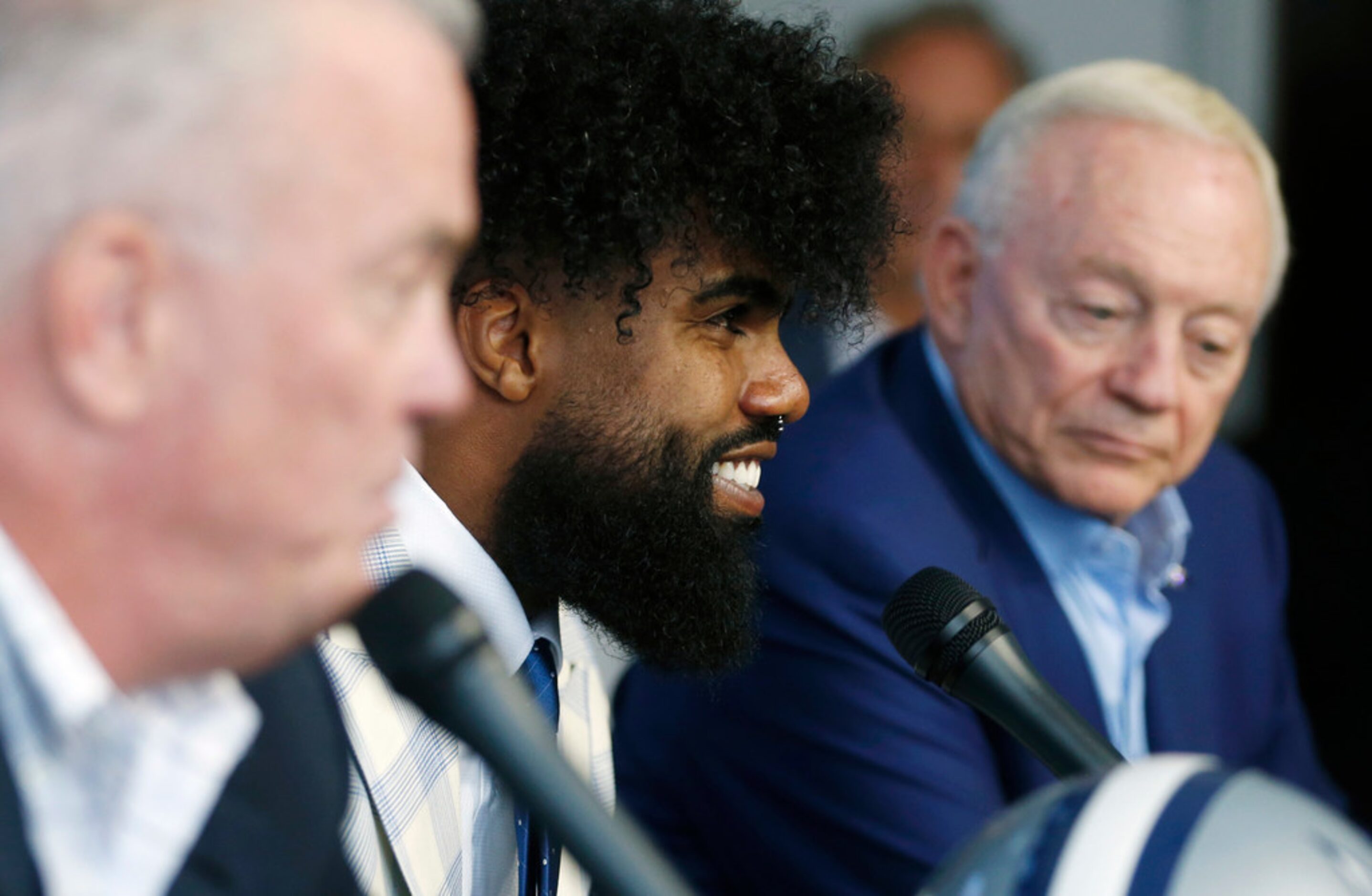 Dallas Cowboys running back Ezekiel Elliott (21) smiles as Dallas Cowboys executive vice...