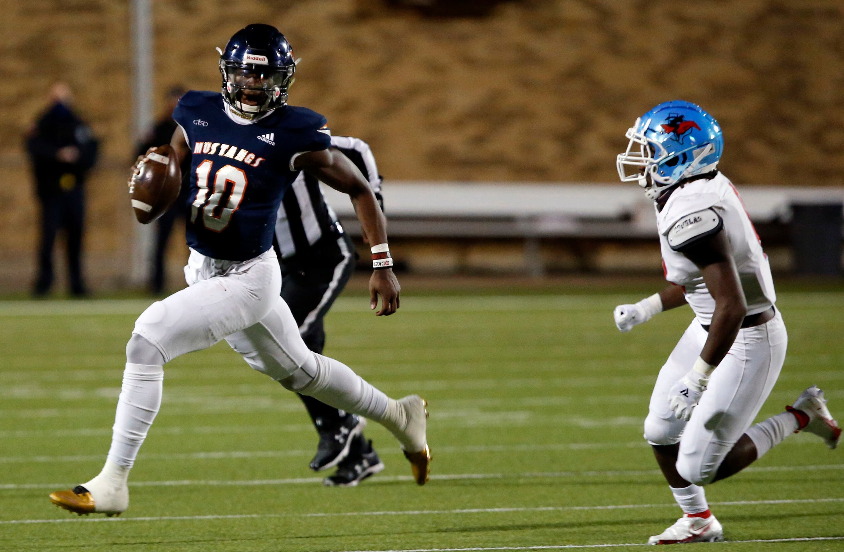 Sachse QB Alex Orji (10) scrambles from a Skyline defender during the first half of a high...
