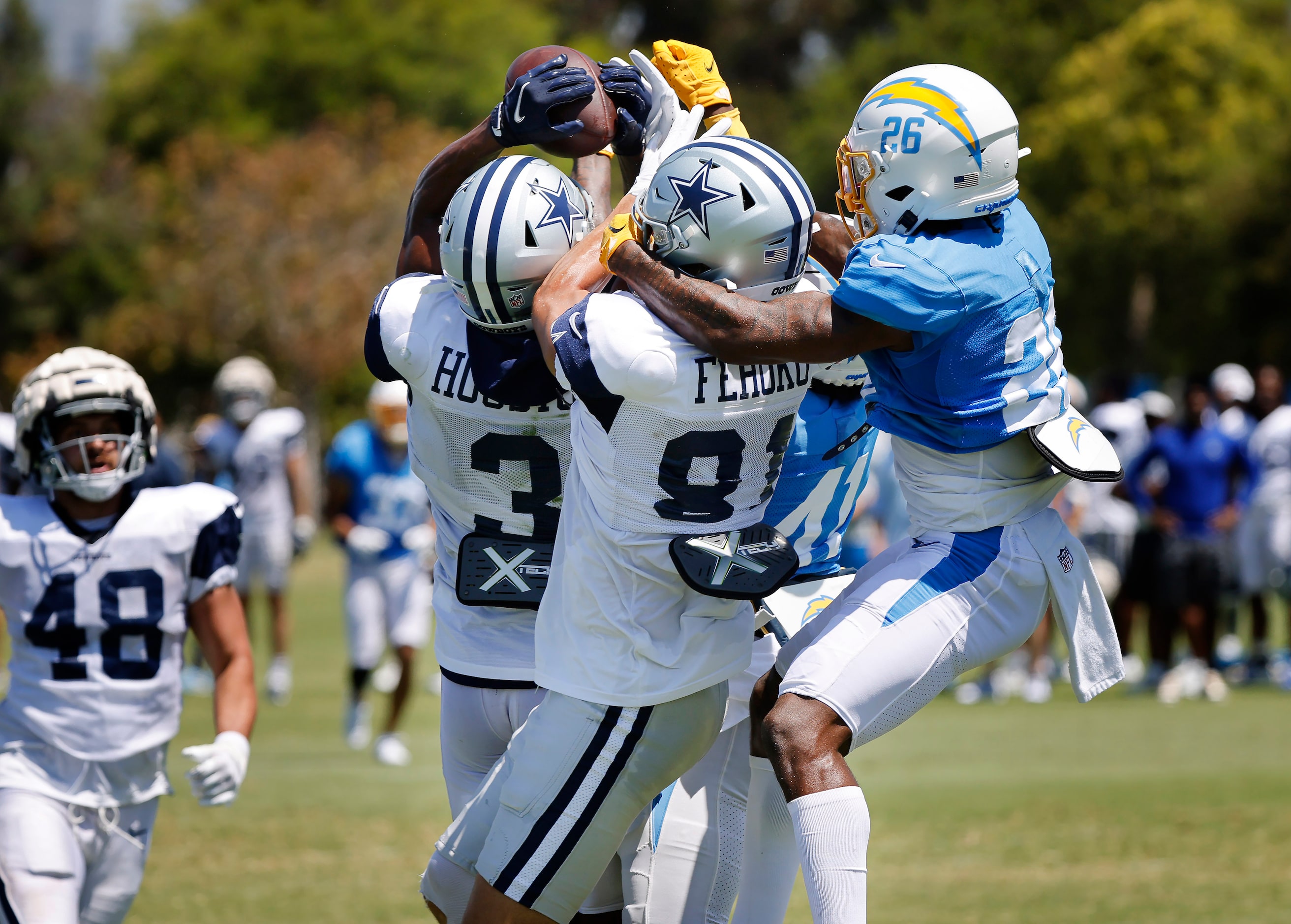 Dallas Cowboys wide receiver Dennis Houston (3) comes down with a Hail Mary pass from...