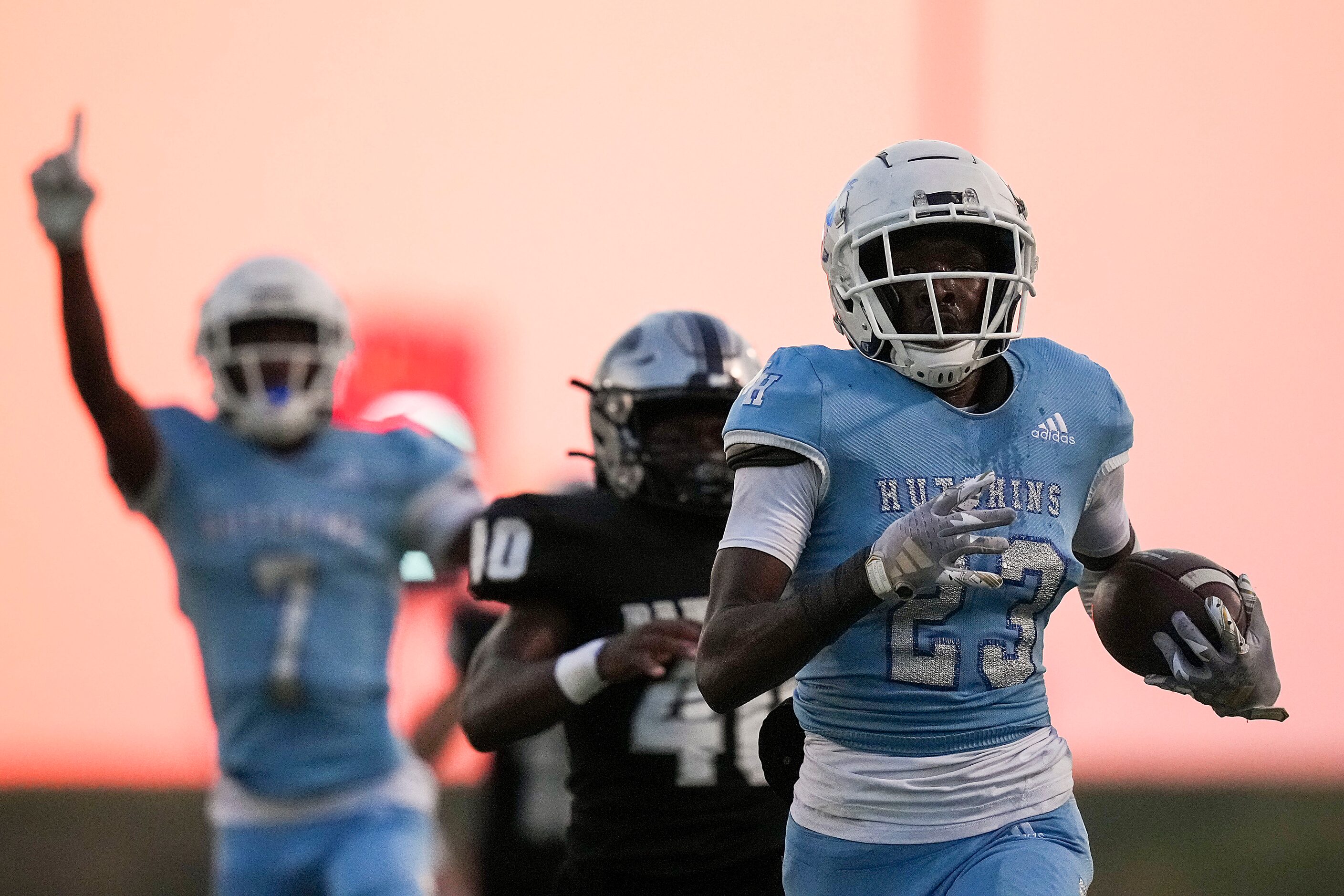 Wilmer-Hutchins wide receiver Jayvon Roe (23) returns a kickoff for a touchdown during the...