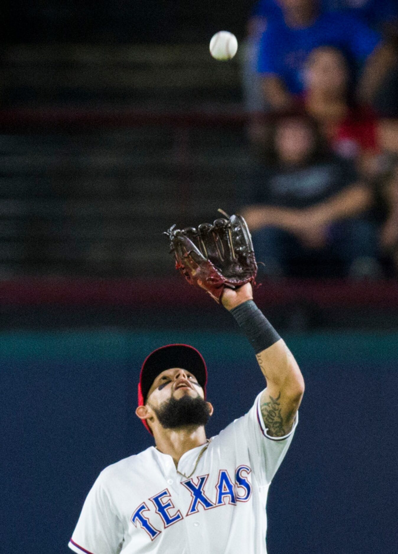 Texas Rangers second baseman Rougned Odor (12) catches a fly ball hit by Los Angeles Angels...