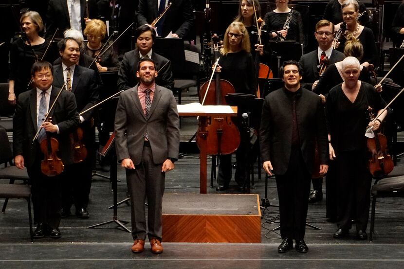 Composer Jimmy Lopez and conductor Miguel Harth-Bedoya take a bow after the Fort Worth...
