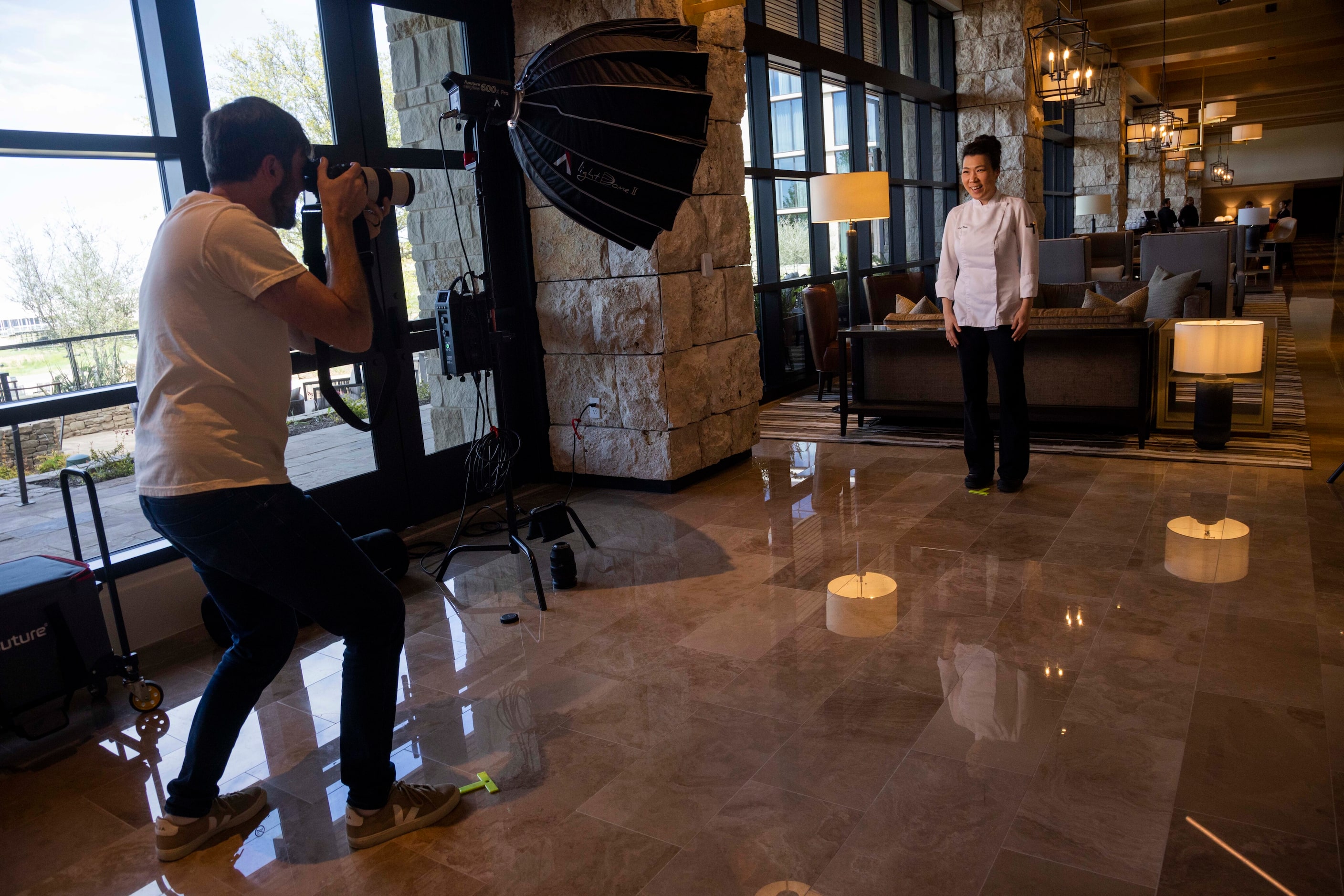 Leen Nunn, executive pastry chef for the Omni PGA Frisco Resort, laughs while getting a...