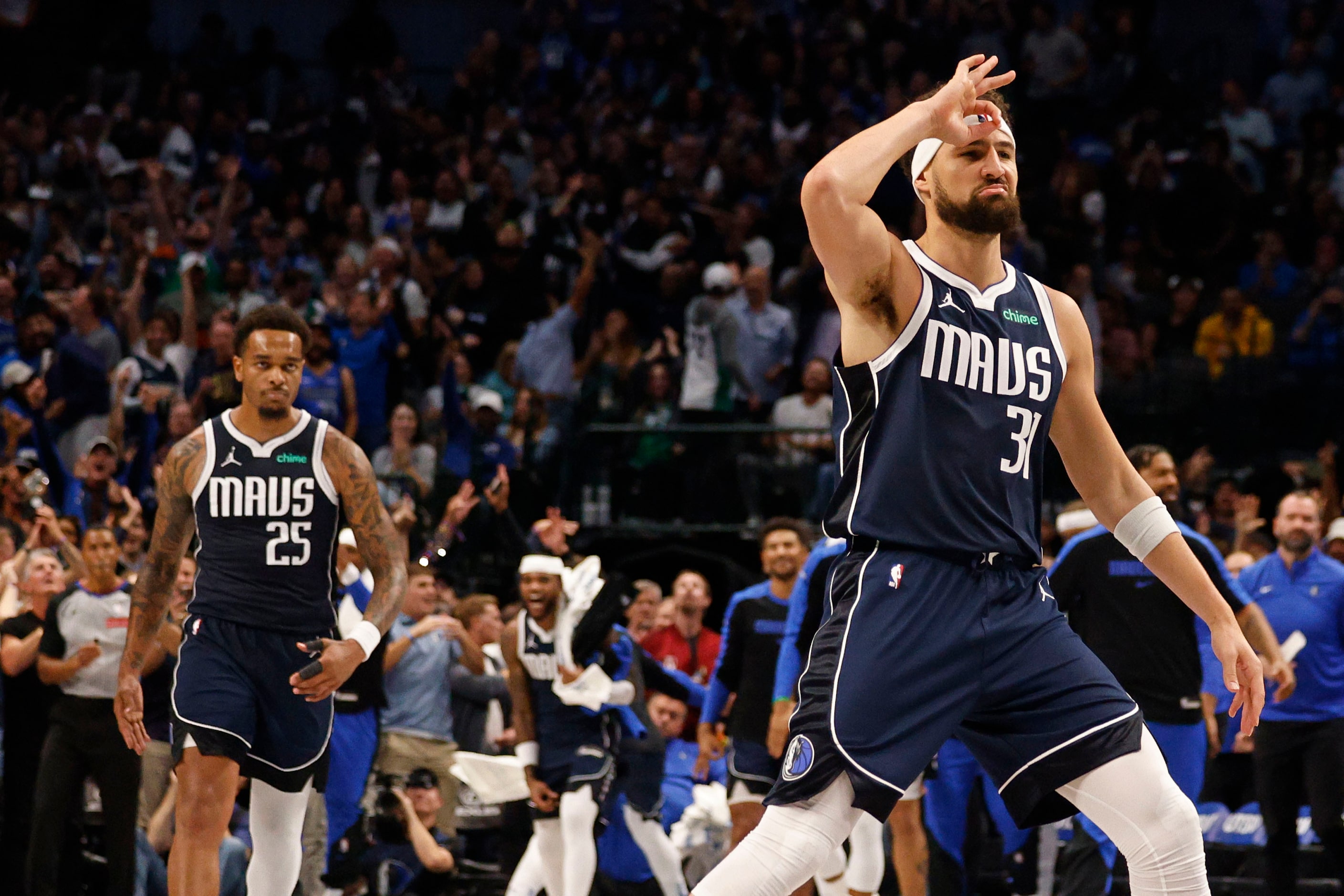 Dallas Mavericks guard Klay Thompson (31) gestures after scoring against the Houston Rockets...