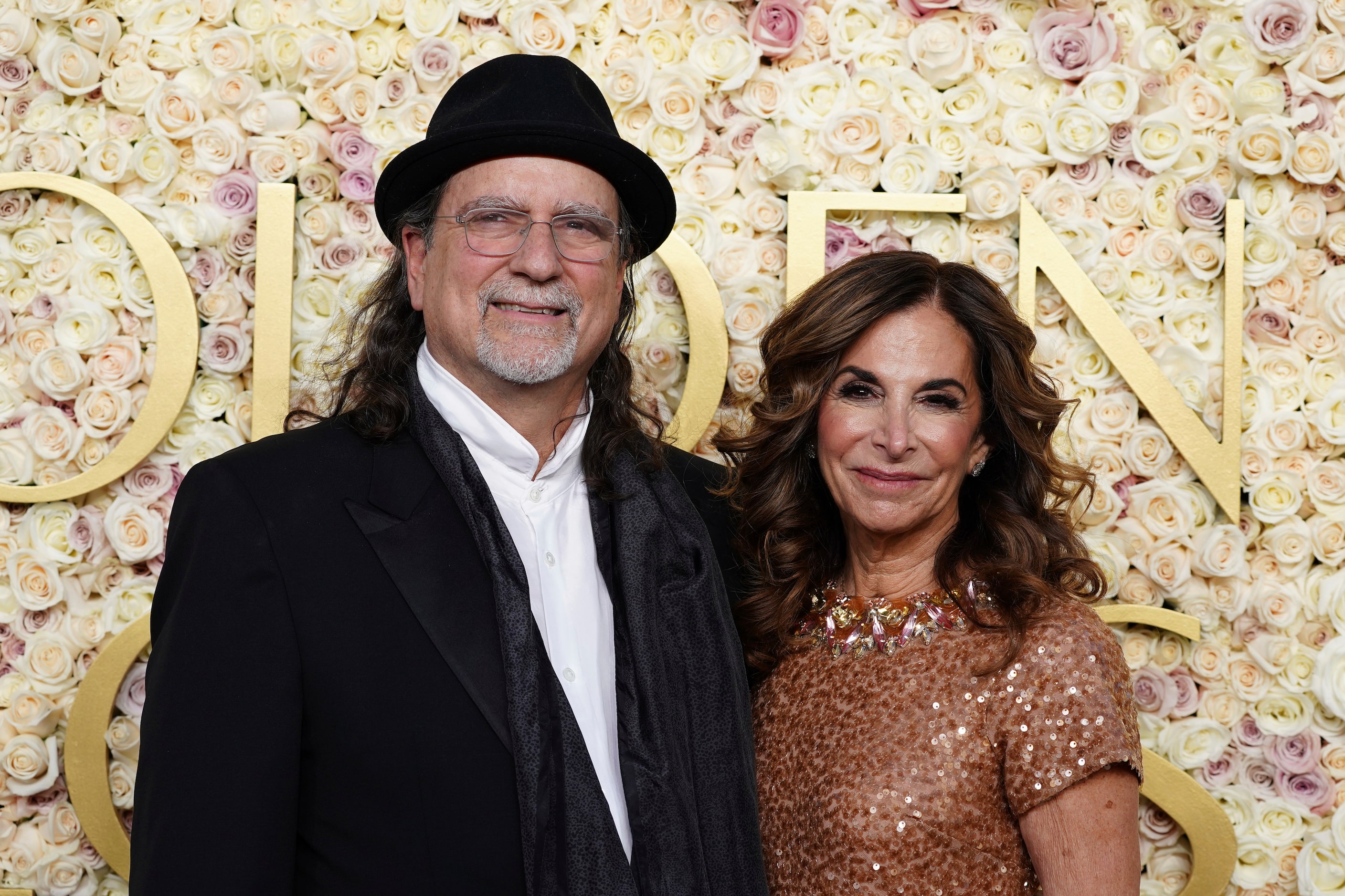 Glenn Weiss, left, and Jan Svendsen arrive at the 82nd Golden Globes on Sunday, Jan. 5,...