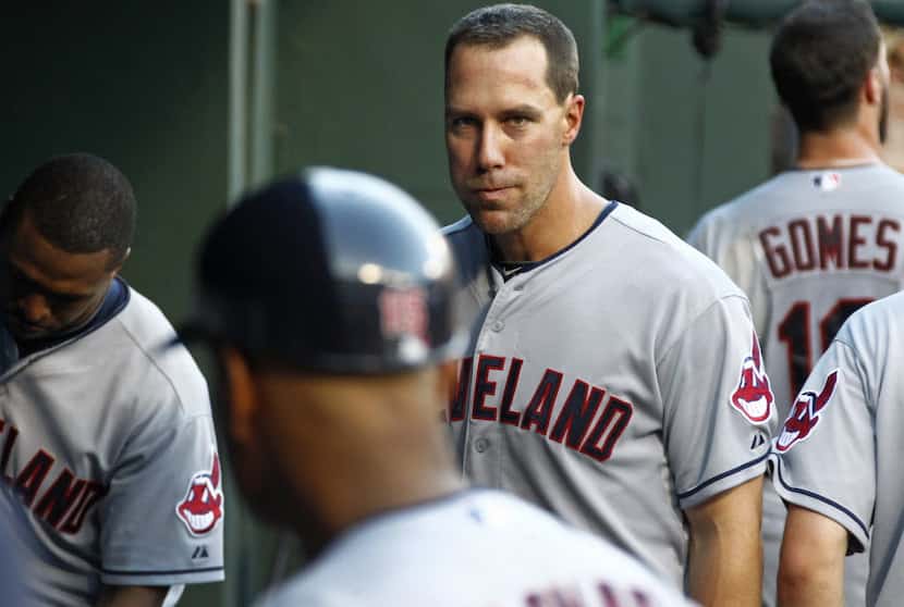 former Texas Rangers outfielder David Murphy is pictured in the Indians' dugout during the...