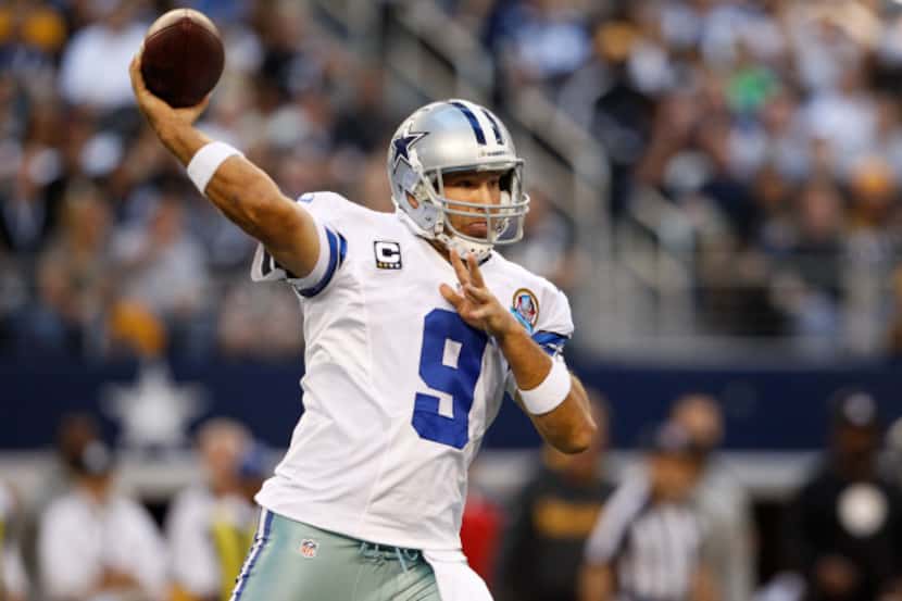 Dallas Cowboys quarterback Tony Romo (9) throws a pass down the field against the Pittsburgh...