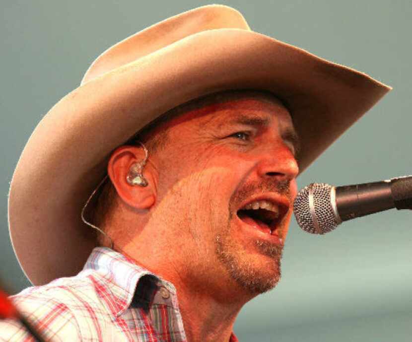 Kevin Costner leads his band Modern West during the Stagecoach Country Music Festival in 2009.