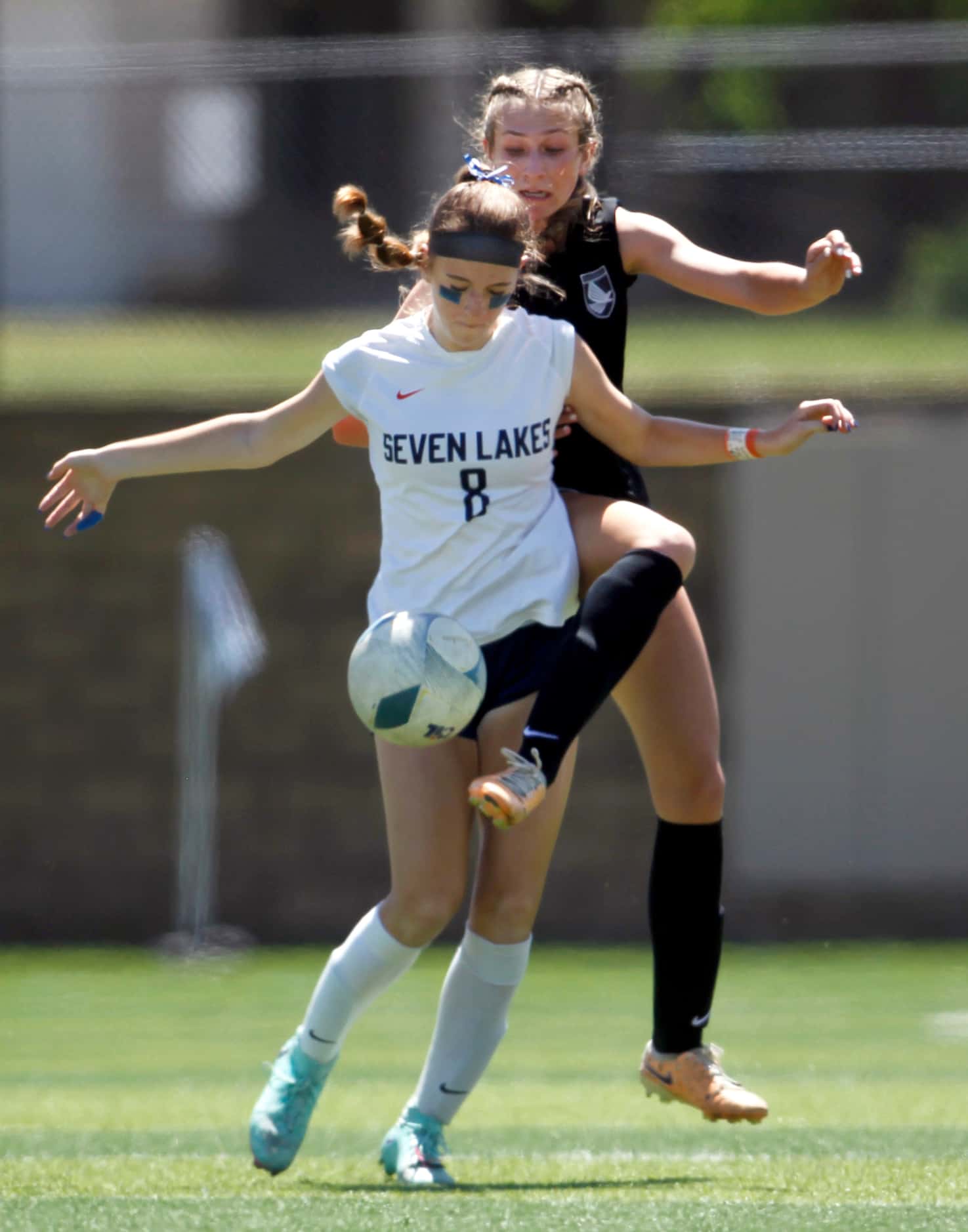 Prosper defenseman Rhiannon Mahon (5), background, attempts to make a steal from Katy Seven...
