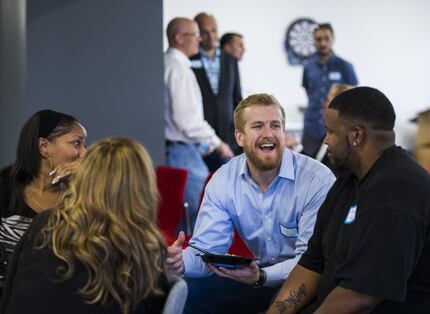 Participants chat during an event by Cornbread Hustle, a staffing agency that places...