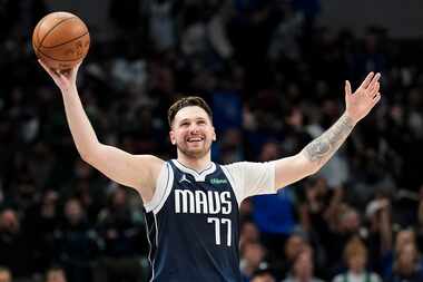 Dallas Mavericks guard Luka Doncic (77) reacts to a call during the second half of an NBA...