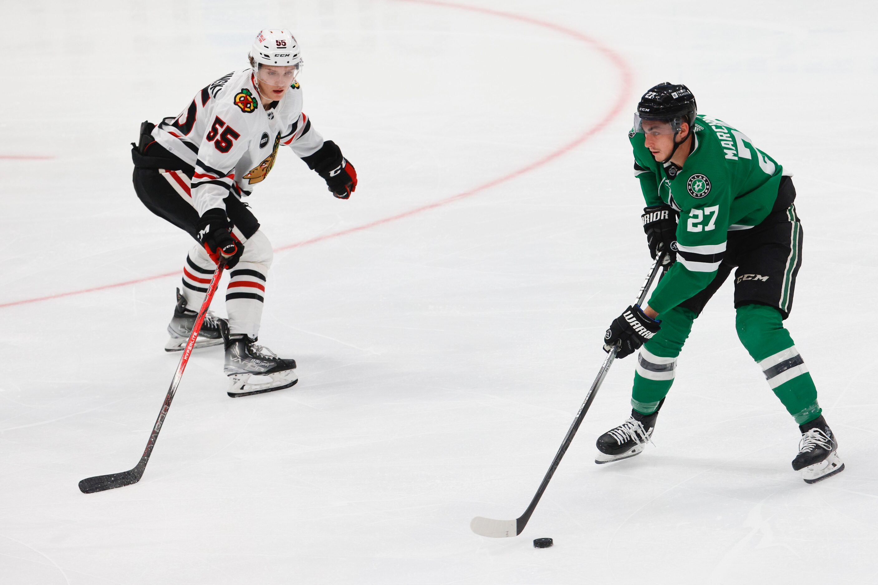 Dallas Stars left wing Mason Marchment (27) handles the ball against Chicago Blackhawks...