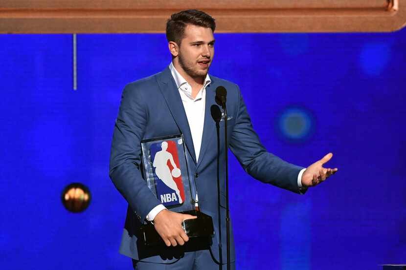 SANTA MONICA, CALIFORNIA - JUNE 24: Luka Doncic accepts the Kia NBA Rookie of the Year award...
