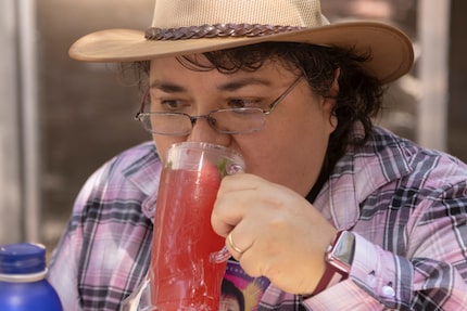 Staff reporter Imelda García tries the Trail-Ade during the opening day of the State Fair of...