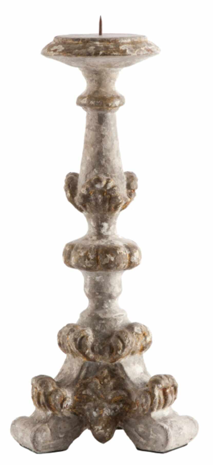 Channel your inner Francophile with a set of Parisian candlesticks of hand-painted resin in...